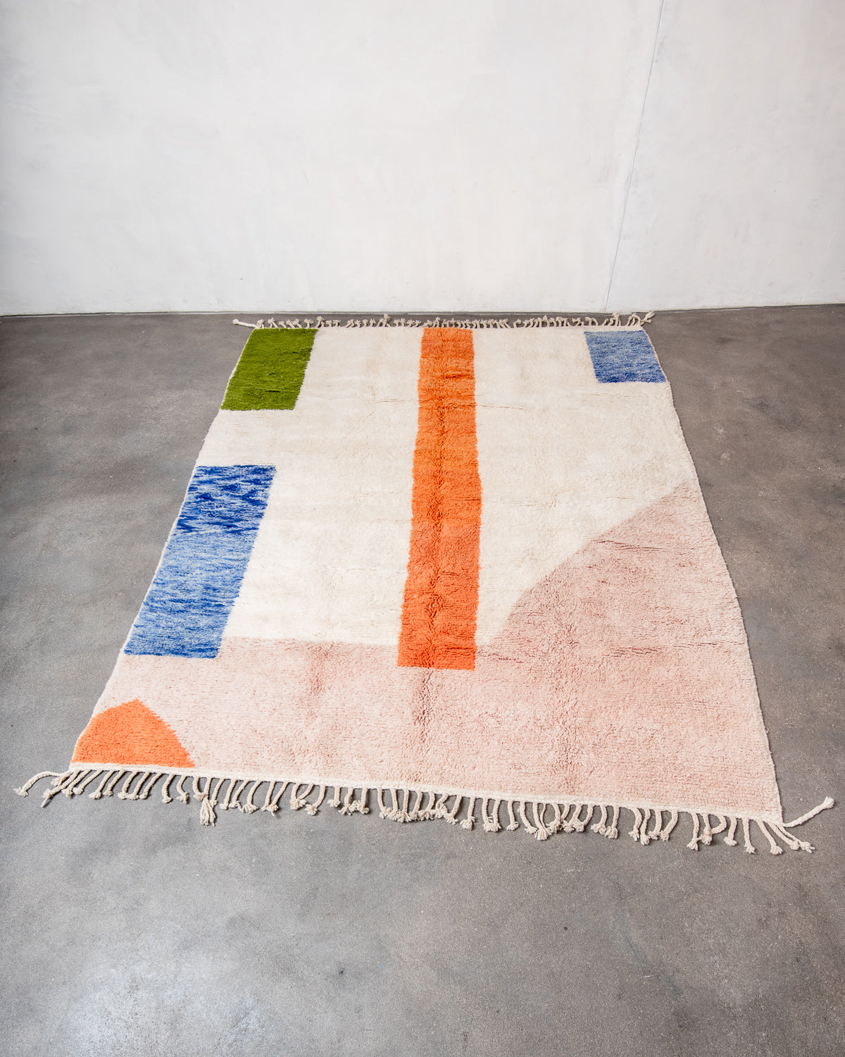 Modern, designer, handcrafted Berber rug from Morocco. Beniourain carpet with beautiful colours and patterns and fluffy wool texture.